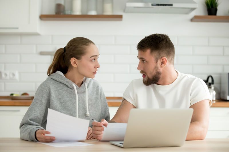 Who saves more women or men couple talking about money
